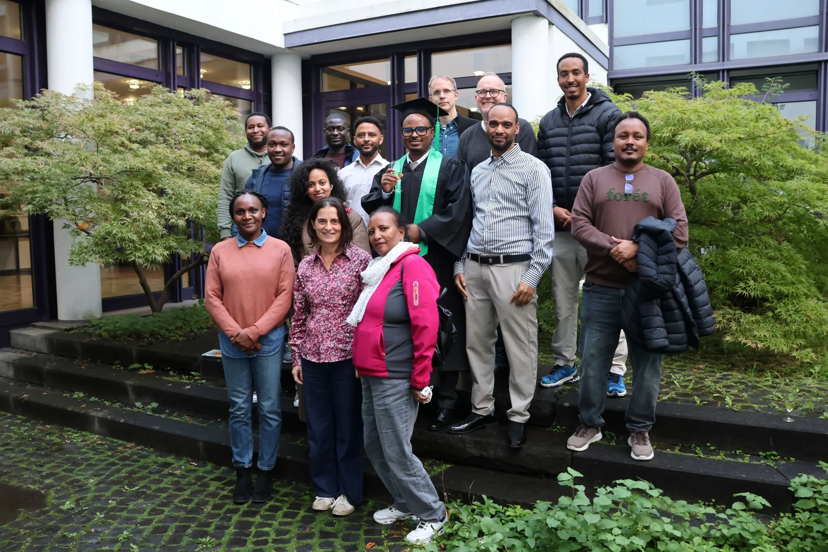 Tikabo Gebreyesus Gerezgherat with family, friends, and supervisors at  ZEF