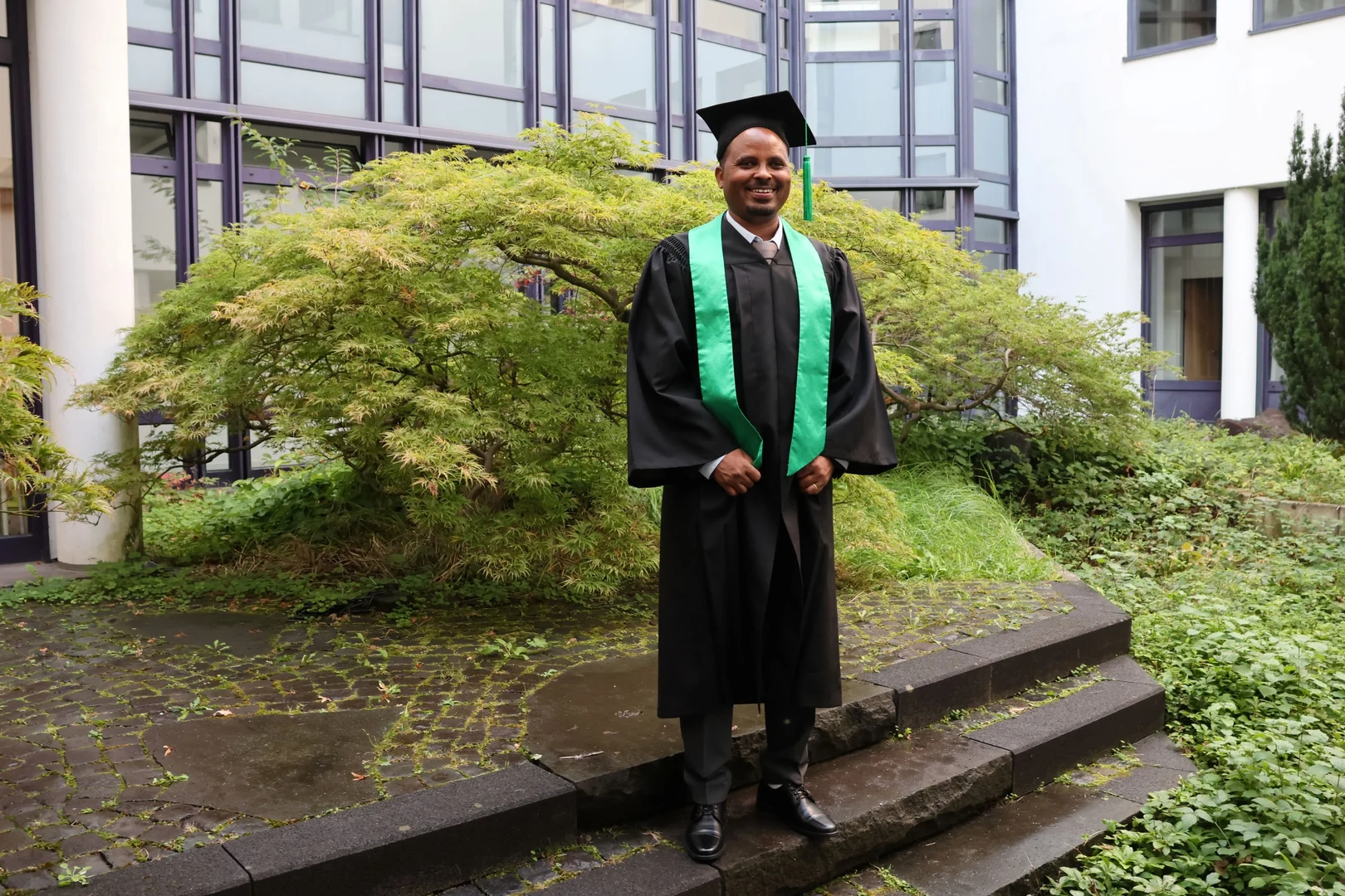 Tikabo Gebreyesus Gerezgher at his doctoral graduation celebration at ZEF