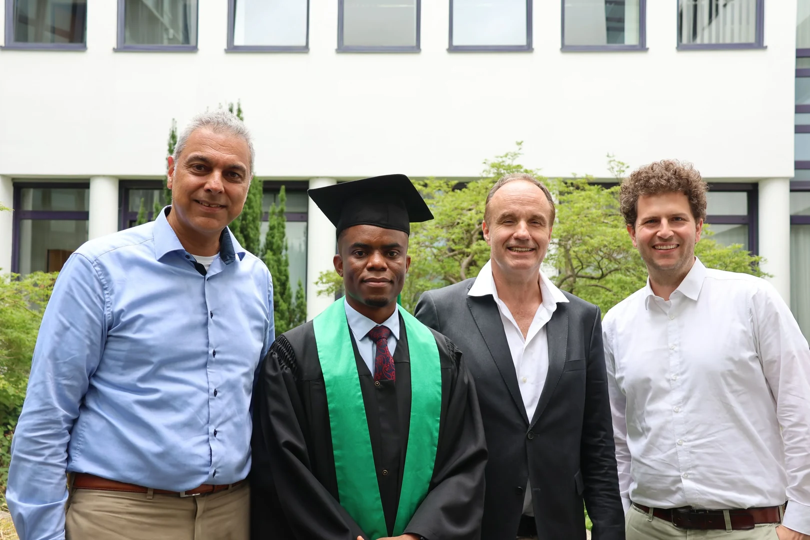 Jackson Elias Nzira with Prof. Dr. Matin Qaim (on the left) and Prof. Dr. Wulf Amelung and Prof. Dr. Niklas Möhring (on the right)