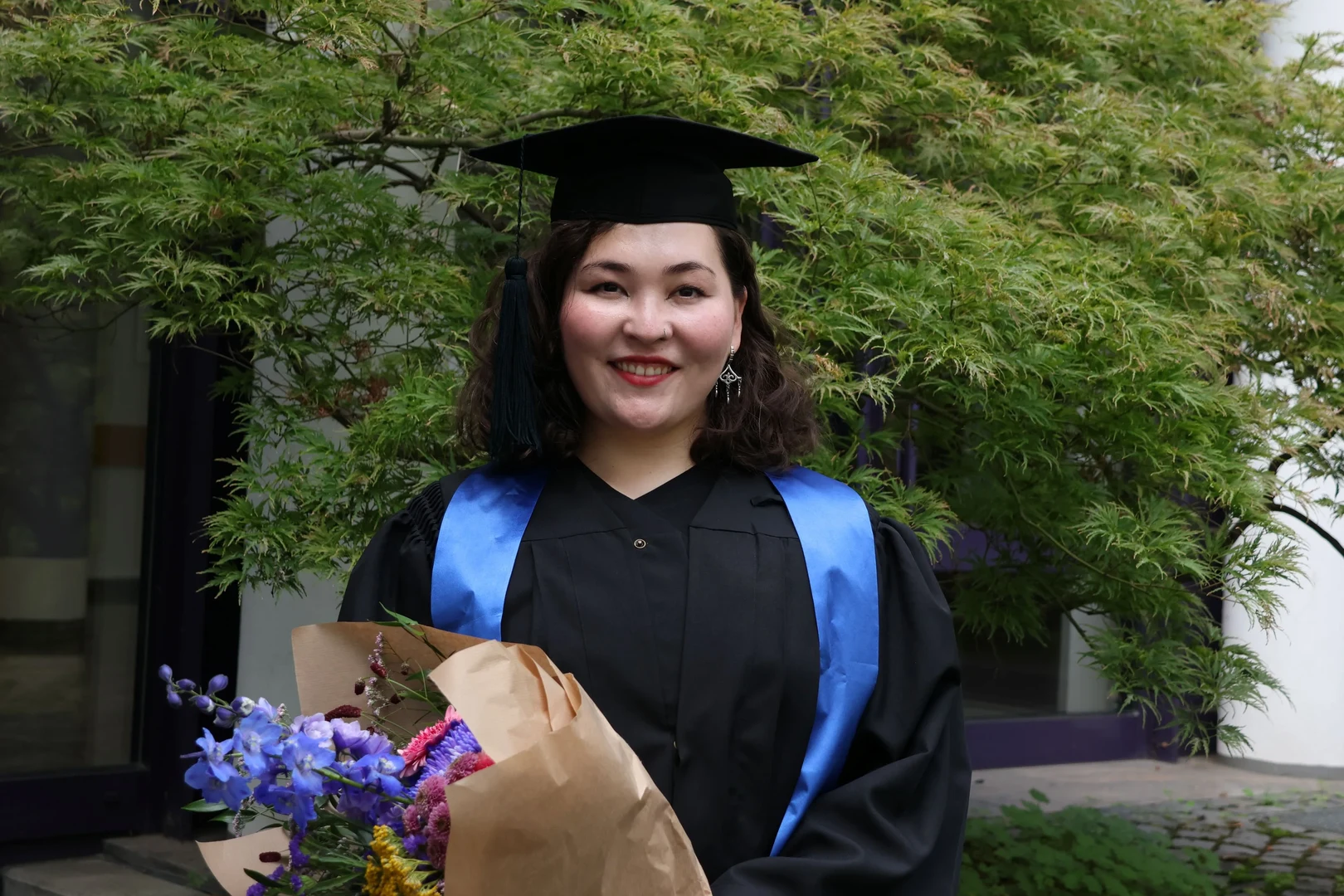 Altynay Kambekova after her successfull doctoral defense at ZEF